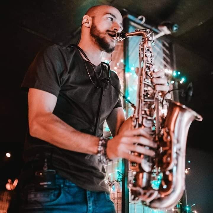 Victor Jazz saxophone performance portrait at Cyprus club wedding